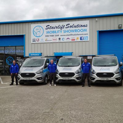 Stairlift Solutions team and vans at the mobility showroom, Londonderry